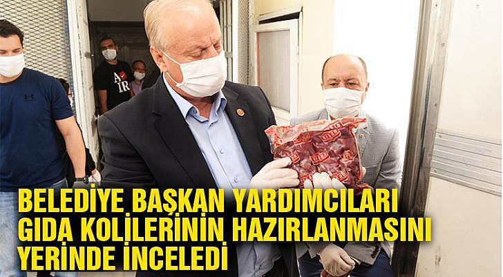 Belediye başkan yardımcıları gıda kolilerinin hazırlanmasını yerinde inceledi